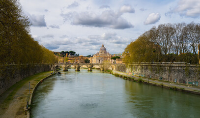 The Tiber River in Rome.View of Vatican City from Sant Angelo Bridge. The dome of St. Peter's church. Discover the beauties of ancient Rome. Beautiful travel picture.