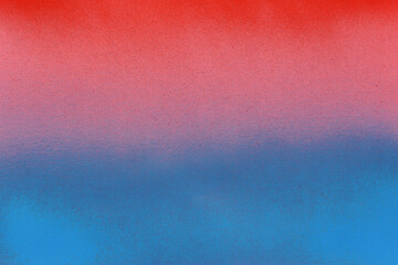 red and blue spray paint on a pink color paper background