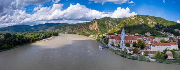 Poster Panorama of Wachau valley with Danube river near Duernstein village in Lower Austria. Traditional wine and tourism region, Danube cruises. © Kotangens