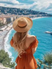 Foto op Canvas Riviera fran√ßaise. Rear view of stunning young lady with hat admiring the urban scenery of Nice, France. © ckybe