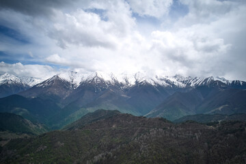 Naklejka premium Mountains and clouds