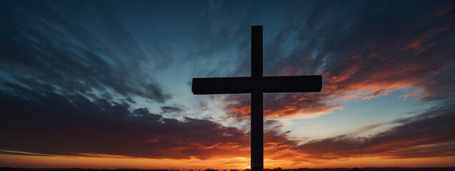 Spiritual silhouette - Jesus Christ's Cross against the backdrop of a captivating sunset sky. 