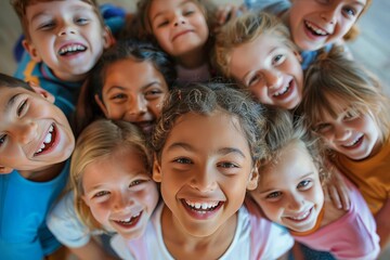 Fototapeta premium A joyful social group of children, with beaming smiles and toothy grins, pose happily together indoors, showcasing the beauty of youth, friendship, and the human face