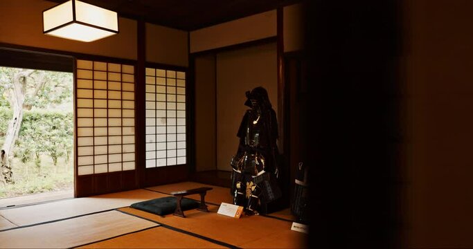 Japan, Samurai suit and wood furniture in living room with retro and Japanese armor with screen door. Minimal, zen decor and wooden counter with tatami mat and carpet with interior design isolated