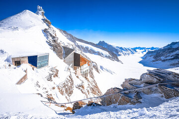 Jungfraujoch Alps peak railway station and Sphinx view, engineering marvel called top of Europ - obrazy, fototapety, plakaty