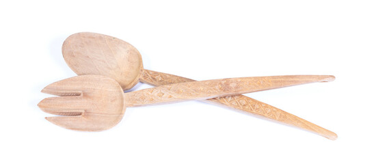 Old wooden spoon and form isolated on white