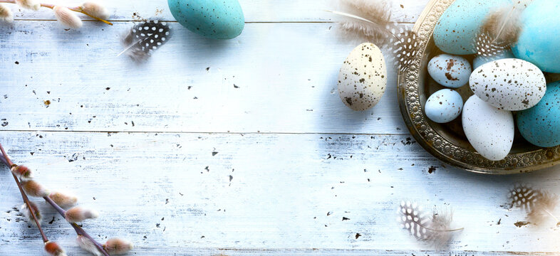  Easter background with Easter eggs on white table