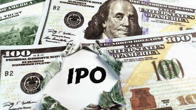 IPO Initial Public Offering mark on dollars. Companies IPO Stock Market Shares