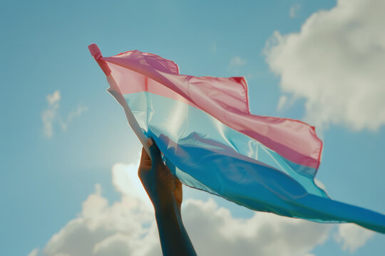 Close up of a transgender flag being waved