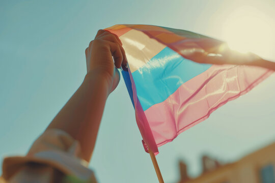 Close up of a transgender flag being waved