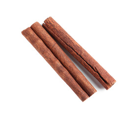 Cinnamon sticks isolated on white, top view