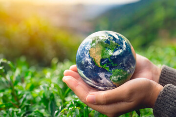 crystal earth in hands. green planet on hand. save of earth. environment concept for background web or world guardian organization. - obrazy, fototapety, plakaty