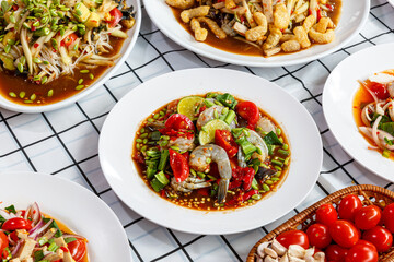 Fermented Anchovy and Prawn Papaya Salad, Delicious Thai food is spicy and hot.