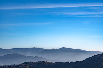 Range of Jaworzyna Krynicka of Beskid Sadecki Mountains in early spring. View from Pieniny Mountains.