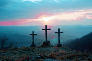 Three crosses stand on a hill with a stunning sunset in the background, symbolizing faith, hope, and spirituality. - obrazy, fototapety, plakaty