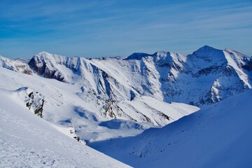 snow covered mountains, viewpoint from Vanatoarea Buteanu Peak, Fagaras Mountains, Romania