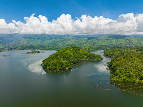 Lake Sebu and mountain with forest, jungle and trees. Blue sky and clouds. Mindanao, Philippines. Travel concept.