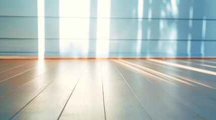 Soft blue wall and wooden floor with light reflection for building architecture, product display and presentation background.