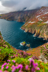 Slieve League or Slieve Liag - A dramatic landscape photo featuring the Slieve League,  The mountain on the Atlantic coast of County Donegal, Ireland. One of the highest sea cliffs in Europe.
