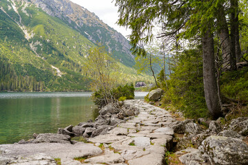 Morskie Oko mountain lake ,  stone path near the pond - obrazy, fototapety, plakaty