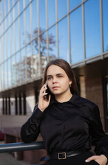 YOUng happy businesswoman outdoor in sunny day