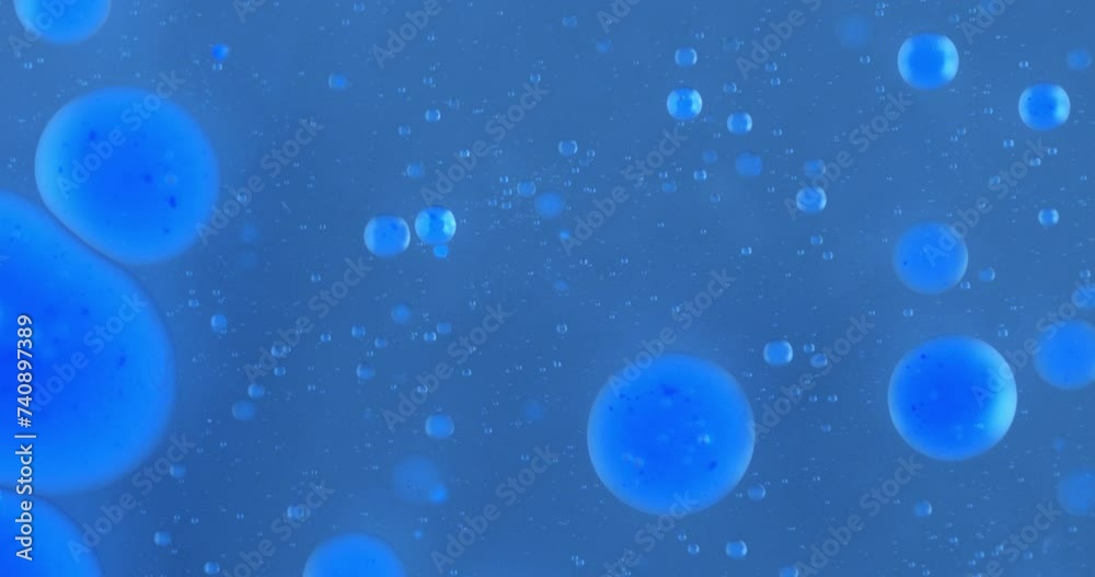 Wall mural slow motion macro of floating micro particles molecules in liquid are analyzed with microscope by ch