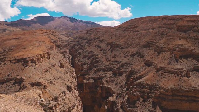Scenic landscape of Spiti Valley.  Large natural canyon between two mountains as seen on the way to Komic village at Spiti Valley, India. Natural pattern and texture of Himalaya mountains. 
