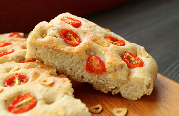 Closeup of Mouthwatering Tomato and Garlic Italian Focaccia Bread