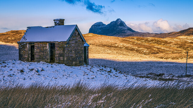 Elphin Bothy and Suilven in the Scottish Highlands region of Assynt.