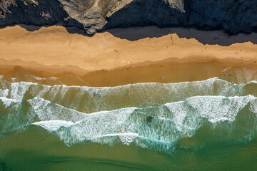 Aerial drone view of Cordoama Beach in Portugal with sandy shore, cliffs and ocean - 740917597