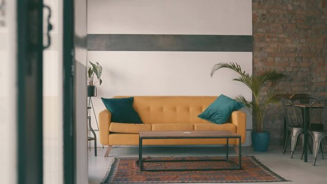Empty, cafe and design of business with furniture and plants for service, startup or entrepreneurship with sofa. Restaurant, shop space and decoration with couch or interior layout in the morning