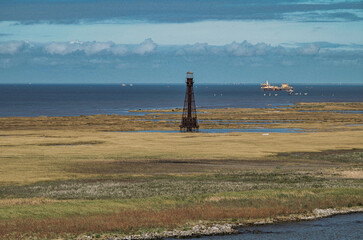 Idyllic scenic nature landscape scenery in Mississippi River delta with marsh, fisher boats,...