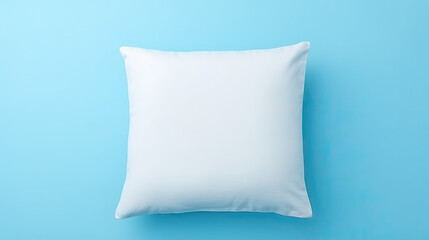 Fototapeta na wymiar White Soft Pillow isolated on blue background