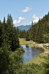 Idyllic Mountain Lake with Wooden Hut in Austrian Alps - 740933732