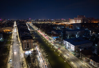 Bucharest from above by night. Aerial photo with the streets of Bucharest and the Palace of the...