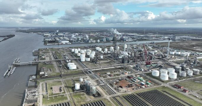 Moerdijk, The Netherlands, petrochemical complex that processes naphtha , gas oil and LPG from refineries into basic chemicals for the plastics industry, such as monomers. Birds eye aerial drone view.