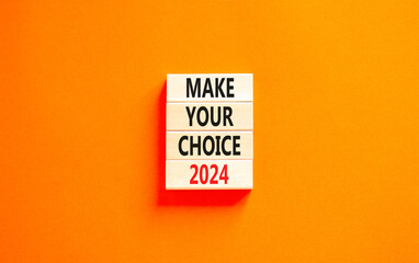 Make your choice 2024 symbol. Concept words Make your choice 2024 on beautiful wooden block. Beautiful orange table orange background. Business Make your choice 2024 concept. Copy space. - obrazy, fototapety, plakaty