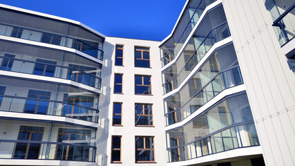 Modern architecture of urban residential apartment building. Apartment building exterior, residential house facade.