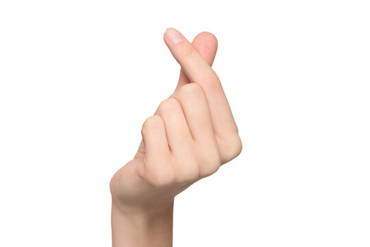 Female hand showing finger heart or mini heart gesture with the index finger and thumb come together like a snap, isolated on transparent background, png file
