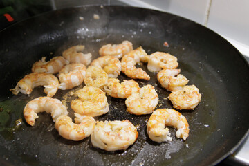 Fish in sauce with shrimp. Step by step preparation. Grilling the shrimp