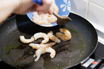 Fish in sauce with shrimp. Step by step preparation. Grilling the shrimp