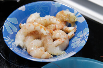 Fish in sauce with shrimp. Step by step preparation. peeled shrimp