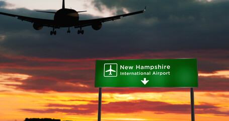 Plane landing in New Hampshire USA airport with signboard