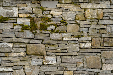 close up  old stonewall texture , stacked rectangular stones