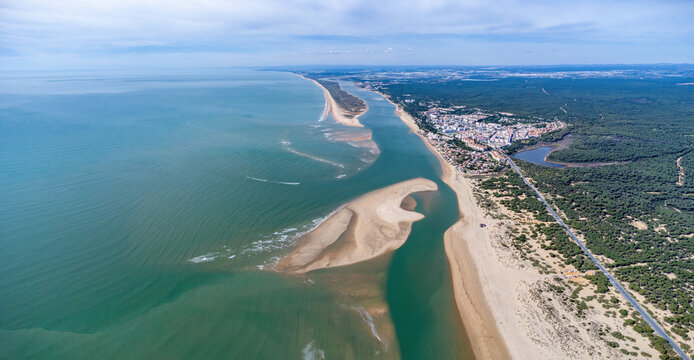 Aerial panoramic view of the Rompido Arrow (La Flecha del Rompido), a sand bank formed on the Rompido and Portil beaches that already reaches La Bota beach, in the municipality of Punta Umbria, Huelva