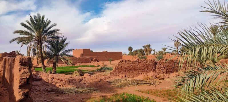 Old houses made of stone and red clay, a village in the middle of the desert with its typical Saharan architecture in the oasis of Timimoun, Algeria