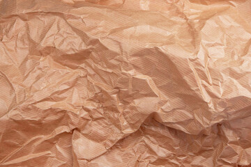 Сrumpled paper texture brown. Texture of crumpled paper. Crumpled paper. Wrinkles paper.