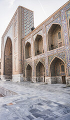 Fototapeta na wymiar Registan Square, Ulugbek Madrasah, Sherdor Mosque Madrasah and Tillya-Kari Madrasah in the ancient city of Samarkand in Uzbekistan, oriental architecture
