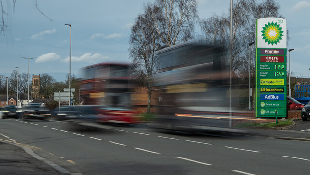 A BP petrol station forecourt with passing traffic. Stourbridge, UK - February 20, 2024
