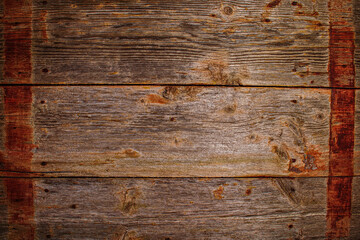 Texture of painted old fence, Vertical plank background Place for text Cracked paint on wooden template Wood texture Flat lay Top view Gray wood surface Red lines from rusted metal sheets